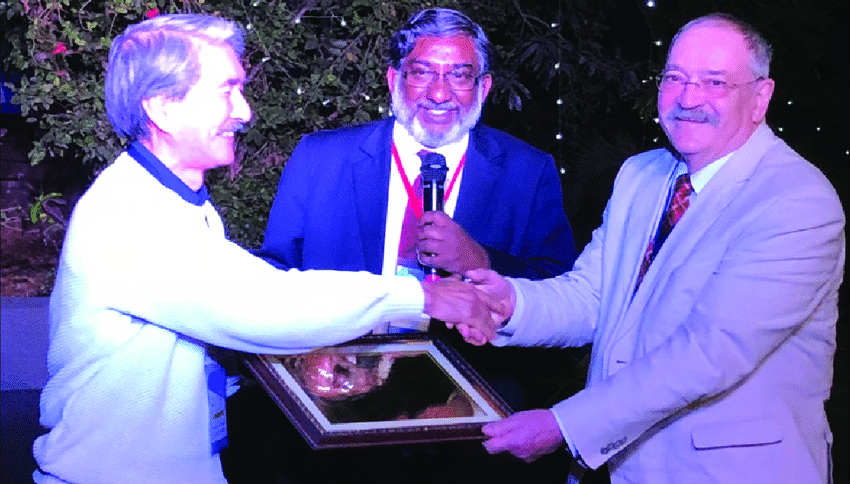 The two awardees for longtime contributions to Raman spectroscopy, Prof Hiro-o Hamaguchi (left) and Prof. Wolfgang Kiefer (right); middle: Prof Siva Umapathy, chair of conference, on the occasion of International conference on "90 Years of Raman Effect" .